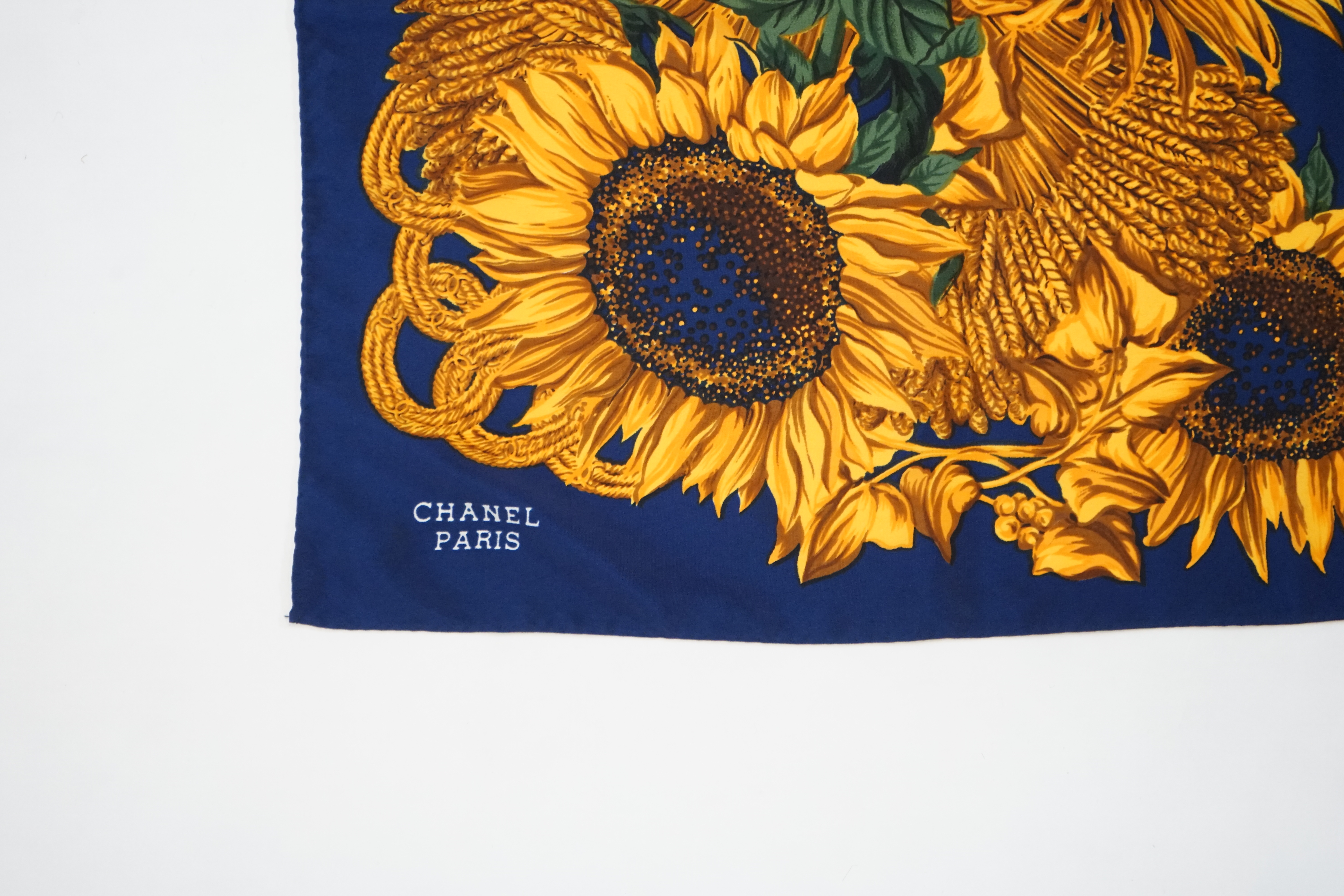 A Vintage Chanel Logo Floral Sunflowers silk scarf, width 86.5cm, height 87.5cm